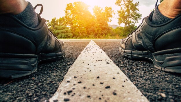 running barefoot on asphalt