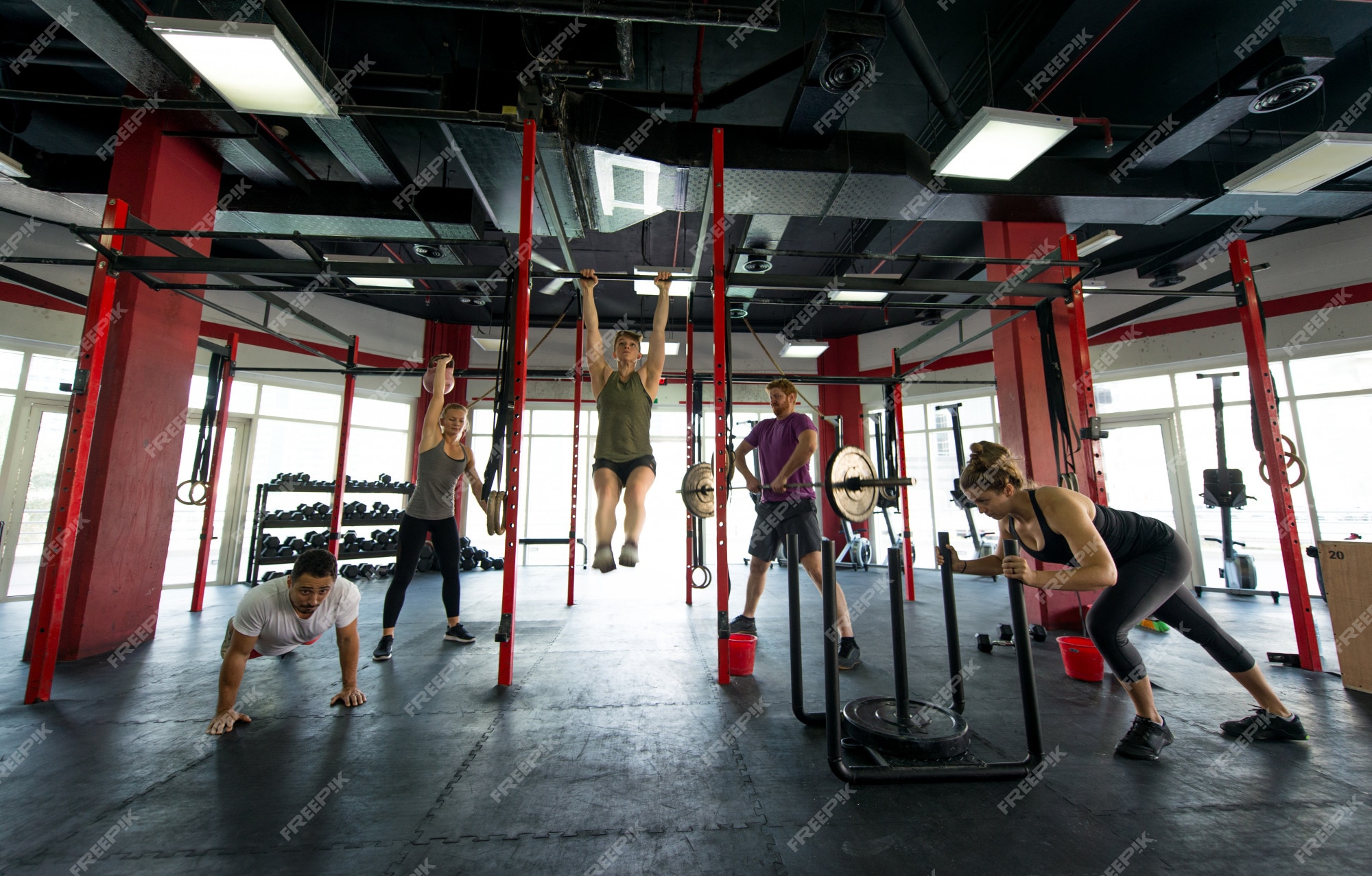 Premium Photo | Athletes training in a cross-fit gym