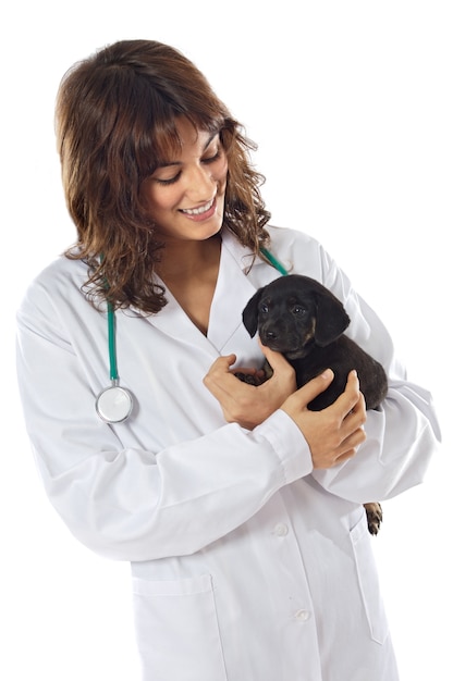 Premium Photo | Attractive lady veterinarian over a white background