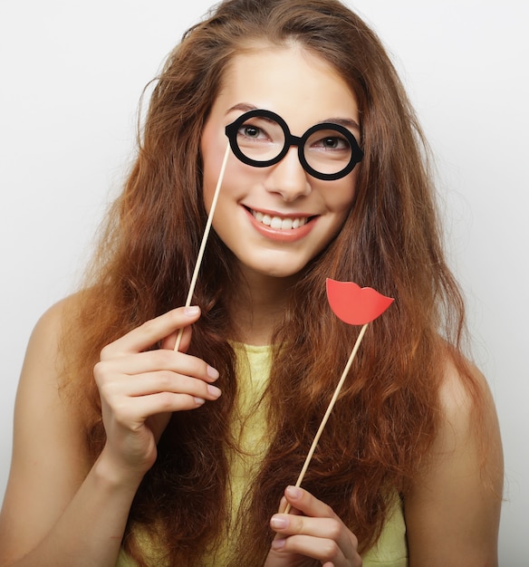 Premium Photo Attractive Playful Young Woman With False Glasses Ready For Party 0705