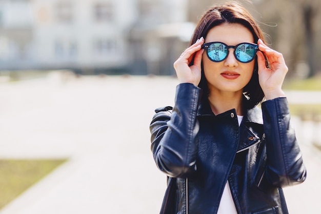 Premium Photo | Attractive young girl in sunglasses on sunny day