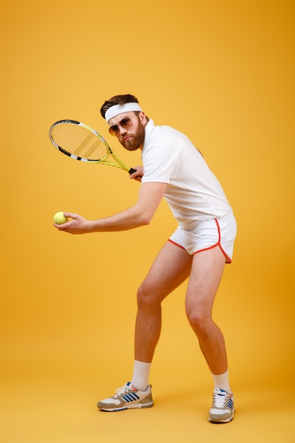 Free Photo | Attractive young tennis player wearing glasses