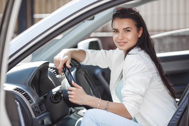 Attractive Young Woman Driving A Car Fancy Woman In The Automobile