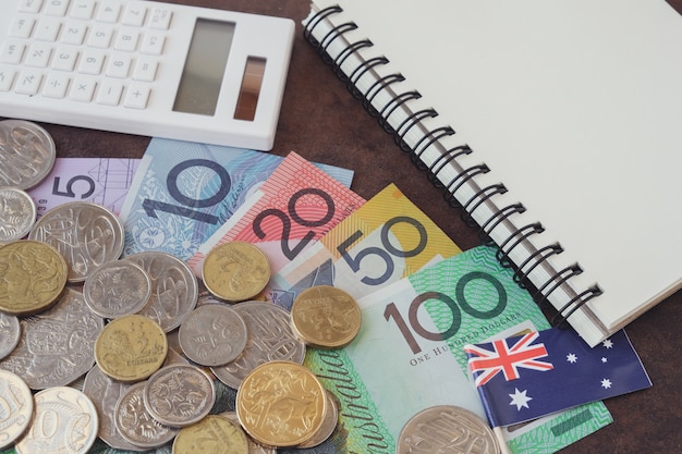 premium-photo-australian-money-aud-calculator-and-notebook