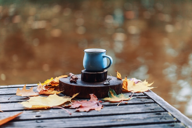 Premium Photo | Autumn composition outdoor. autumn. a cup of hot coffee ...