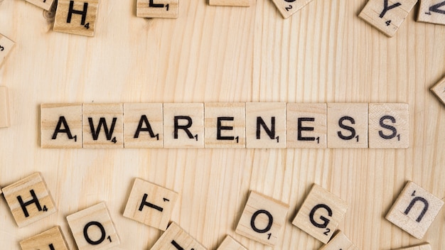 awareness-word-on-wooden-tiles-photo-free-download