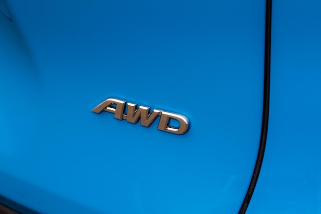 Premium Photo | Awd emblem on modern black suv car detail close up view ...