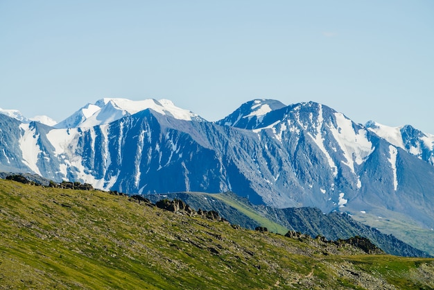 Premium Photo Awesome Aerial View To Big Snowy Rocky Mountains And Great Glacier Under Blue Sky