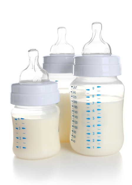 Premium Photo | Baby milk bottles, isolated on white