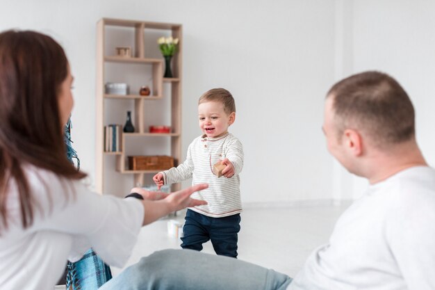 Free Photo Baby And Parents At Home