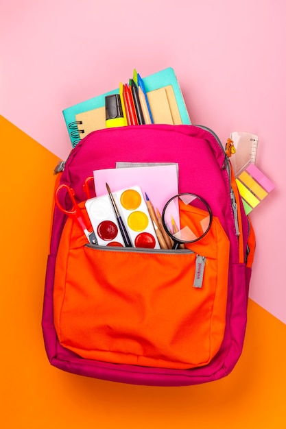 Premium Photo | Back pack with school utensils