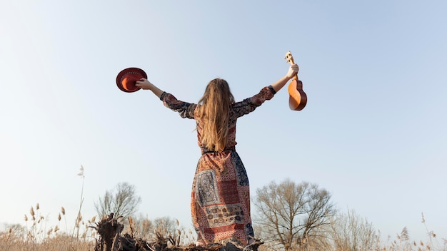 woman with ukulele