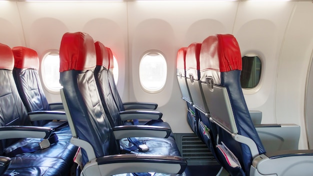 Premium Photo | Background of airplane row empty seats onboard , travel