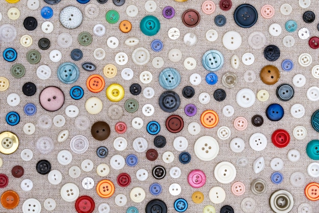 Premium Photo | Background - buttons of different colors and sizes lie ...