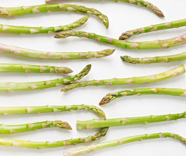 Background from isolated on white background asparagus. top view Free Photo