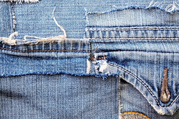 Premium Photo | Background made of old jeans rags close up