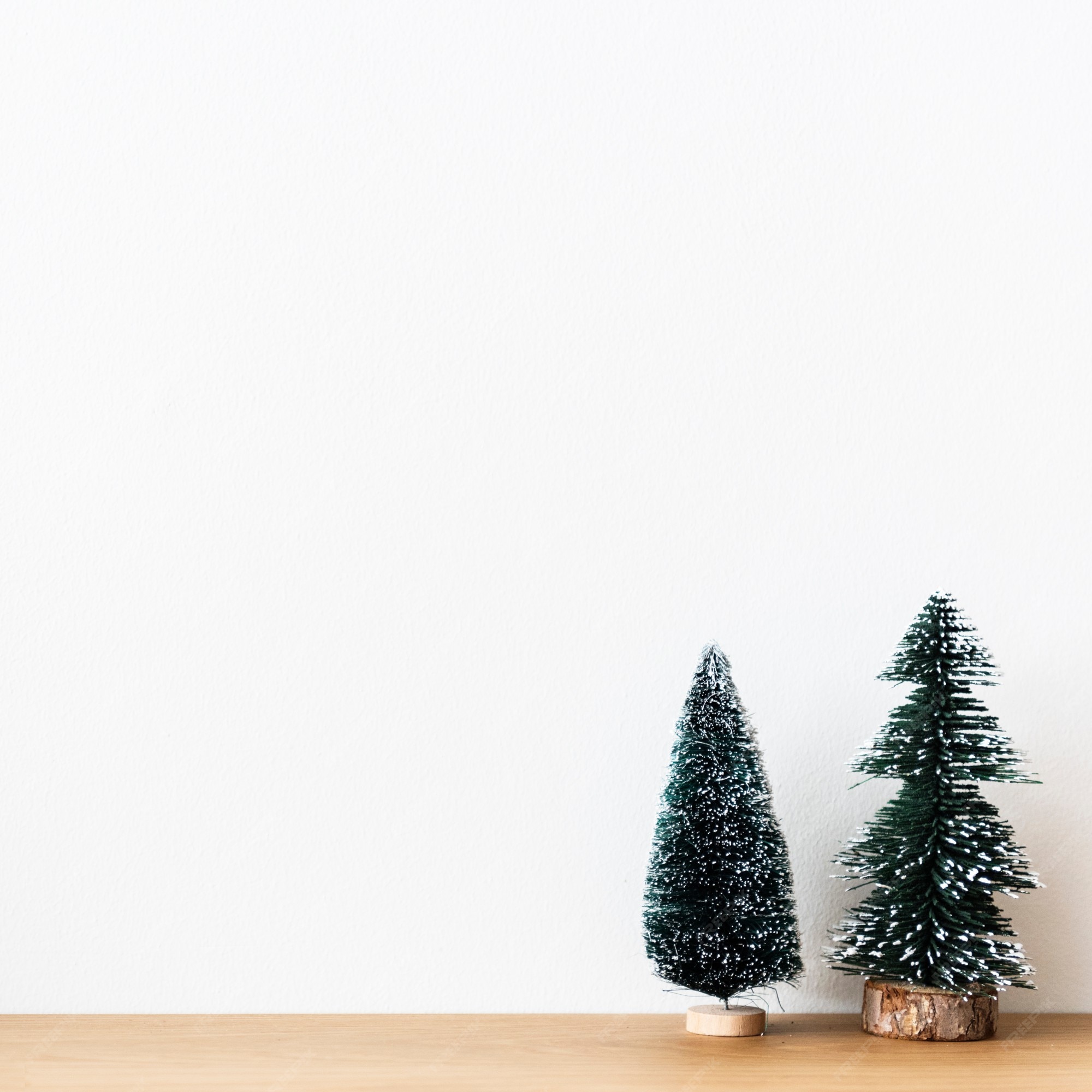 Free Photo | Background mini christmas pine trees