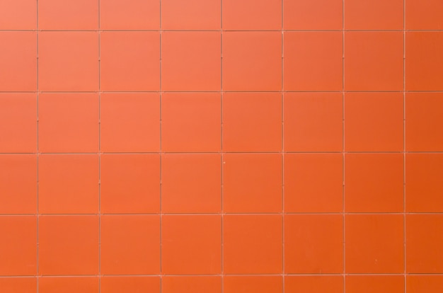 Premium Photo | Background orange tiles texture background