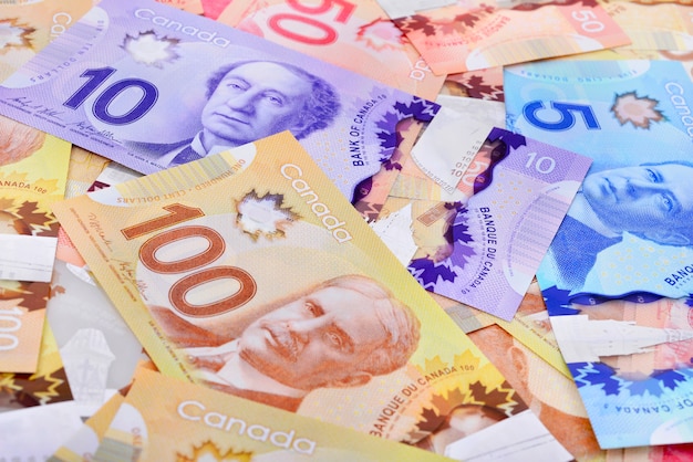 Premium Photo | Background shot of canadian banknotes