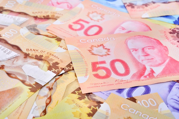 Premium Photo | Background shot of canadian banknotes