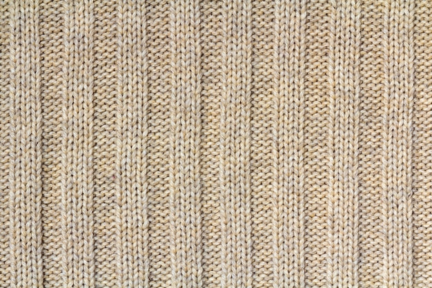 Premium Photo | Background texture of beige pattern knitted fabric made ...