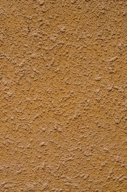 背景 住宅のモダンな漆喰のファサードのテクスチャ 外壁クラッディングマシンベージュ石膏 プレミアム写真