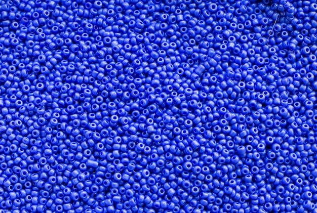 Premium Photo | Background texture of royal blue color beads closeup ...