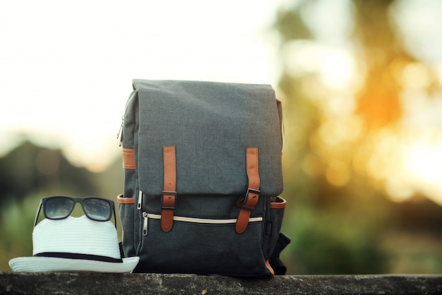 Backpack with sunset Free Photo