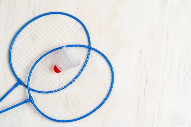 Premium Photo | Badminton equipment. rackets and shuttlecock, top view