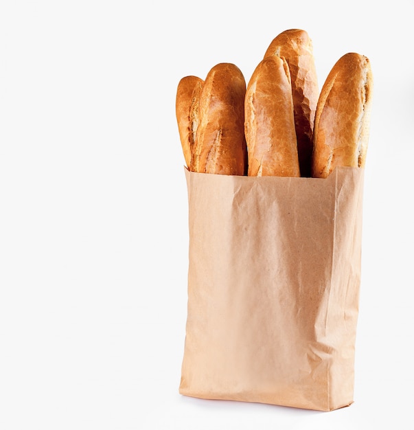 Premium Photo | Baguette bread in paper bag