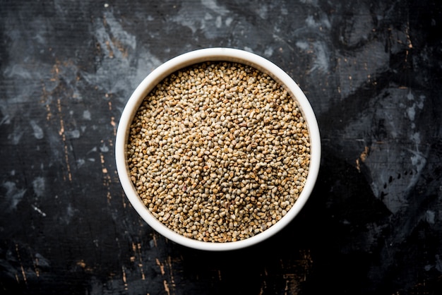 Premium Photo | Bajra or pearl millet or sorghum grains in a bowl ...