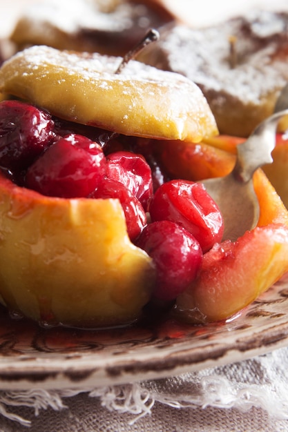 Premium Photo | Baked apples with cranberries closeup