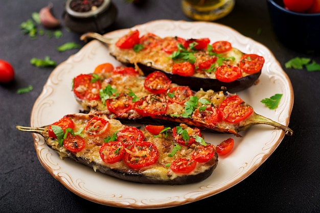 Premium Photo | Baked eggplants with mozzarella and tomatoes with ...