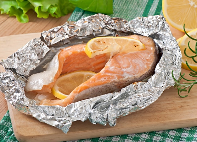 Premium Photo Baked Salmon In Foil With Lemon And Onion
