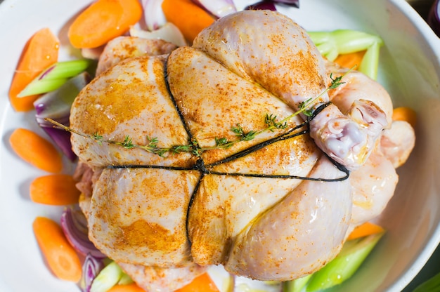 Premium Photo A Baking Sheet With A Piece Of Raw Chicken In The Spices