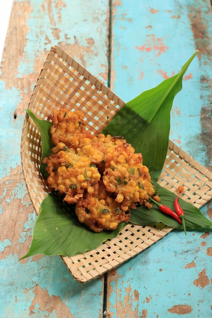 Premium Photo | Bakwan or perkedel jagung is indonesian corn fritter ...