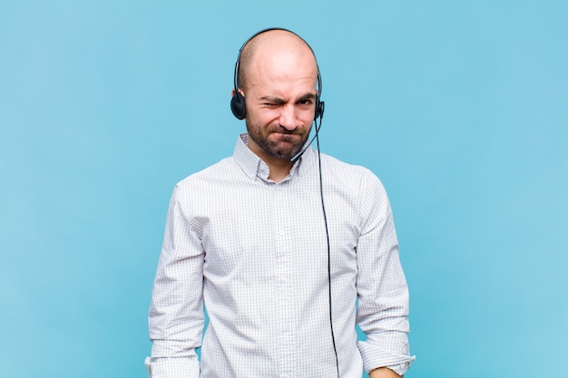 Premium Photo | Bald man looking happy and friendly, smiling and ...