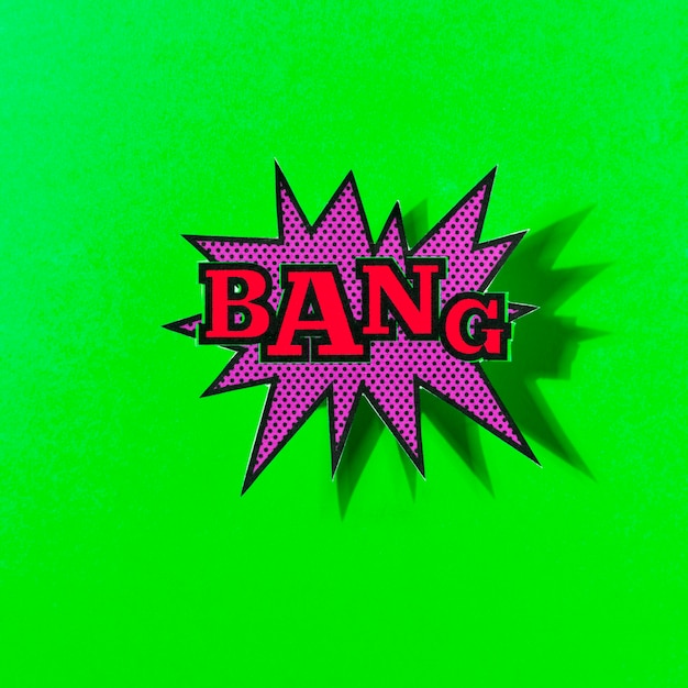 Bang text on explosion bubble against green backdrop Photo | Free Download