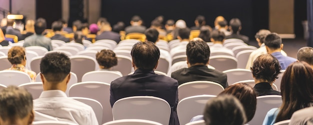 Premium Photo Banner Cover Page Of Rear View Of Audience Listening Speakers On The Stage In The Conference Hall