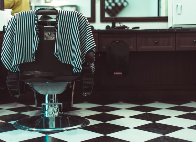 Premium Photo | The barber chair. over the working day in barbershop.