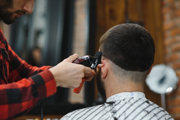 Premium Photo | Barber shop. man with wife in barber's chair ...