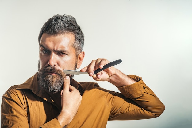 Premium Photo Barbershop Equipment Bearded Man Having Shave In