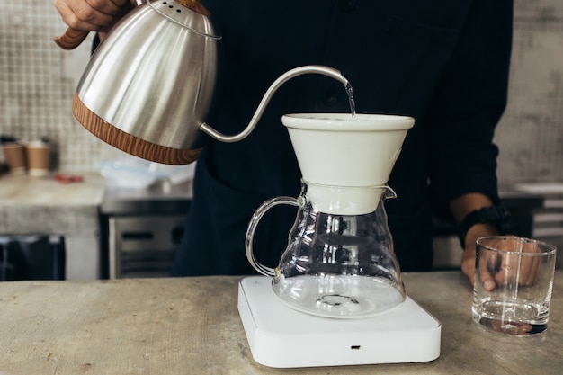 Premium Photo | Barista brewing coffee, method pour over, drip coffee