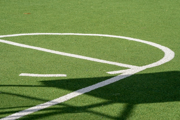 Free Photo | Basket ball court with green grassy ground, artificial ...