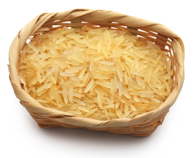 Premium Photo Basmati rice uncooked in a bowl over white background