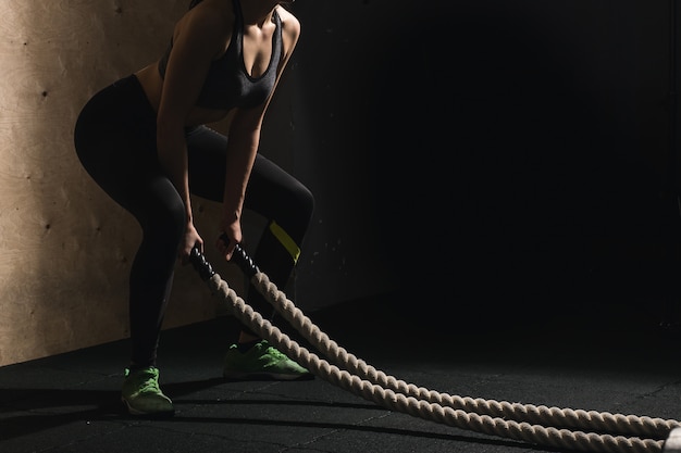 Premium Photo Battling Ropes Girl At Gym Workout Exercise Fitted Body