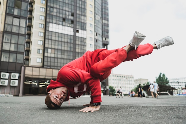 Premium Photo | A Bboy Break Dance Freeze Outdoors, Hip Hop Movement