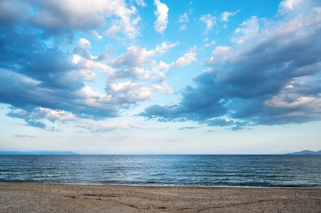 Free Photo A Beach And Aegean Sea Partly Cloudy Sky Greece