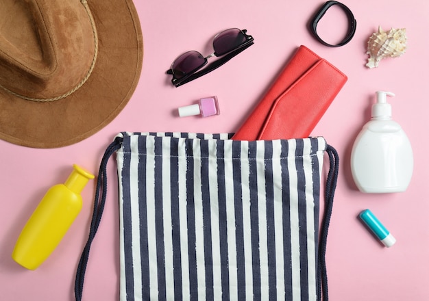 Premium Photo | Beach bag and accessories for relaxing on the beach