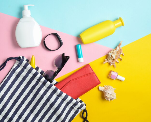 Premium Photo | Beach bag and accessories for relaxing on the beach